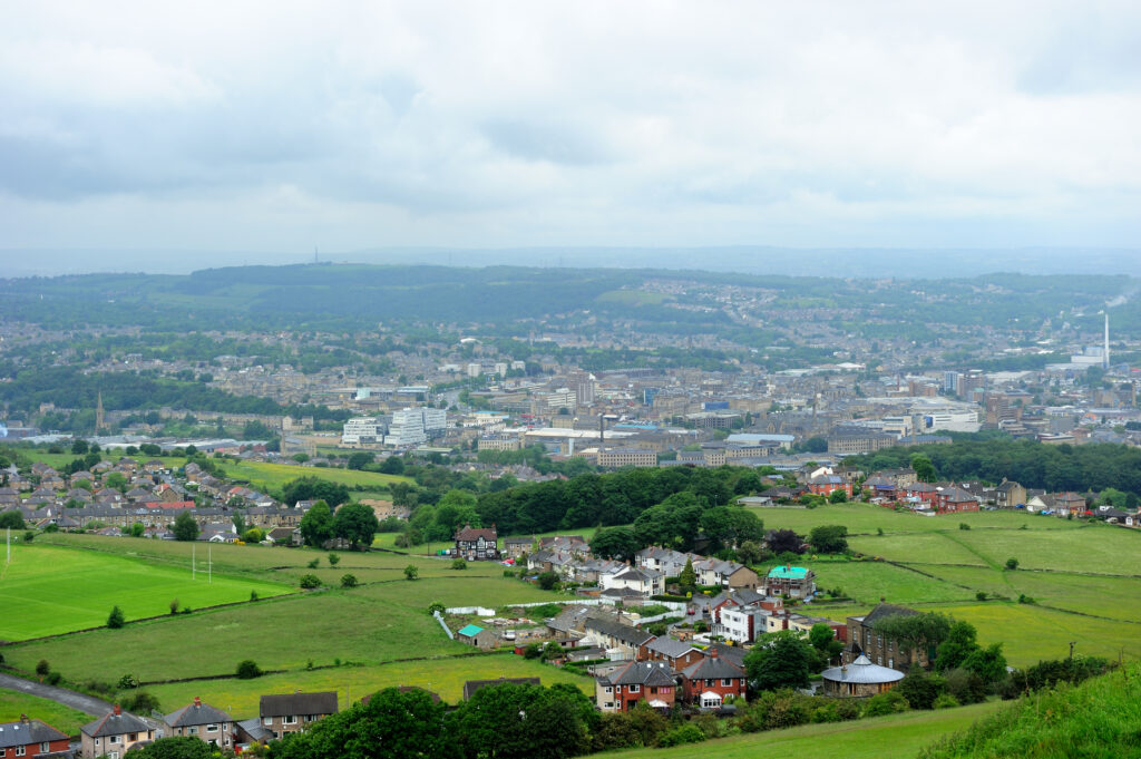 An image, overlooking Huddersfield town on a cloudy day, taken from the top of Castle Hill.